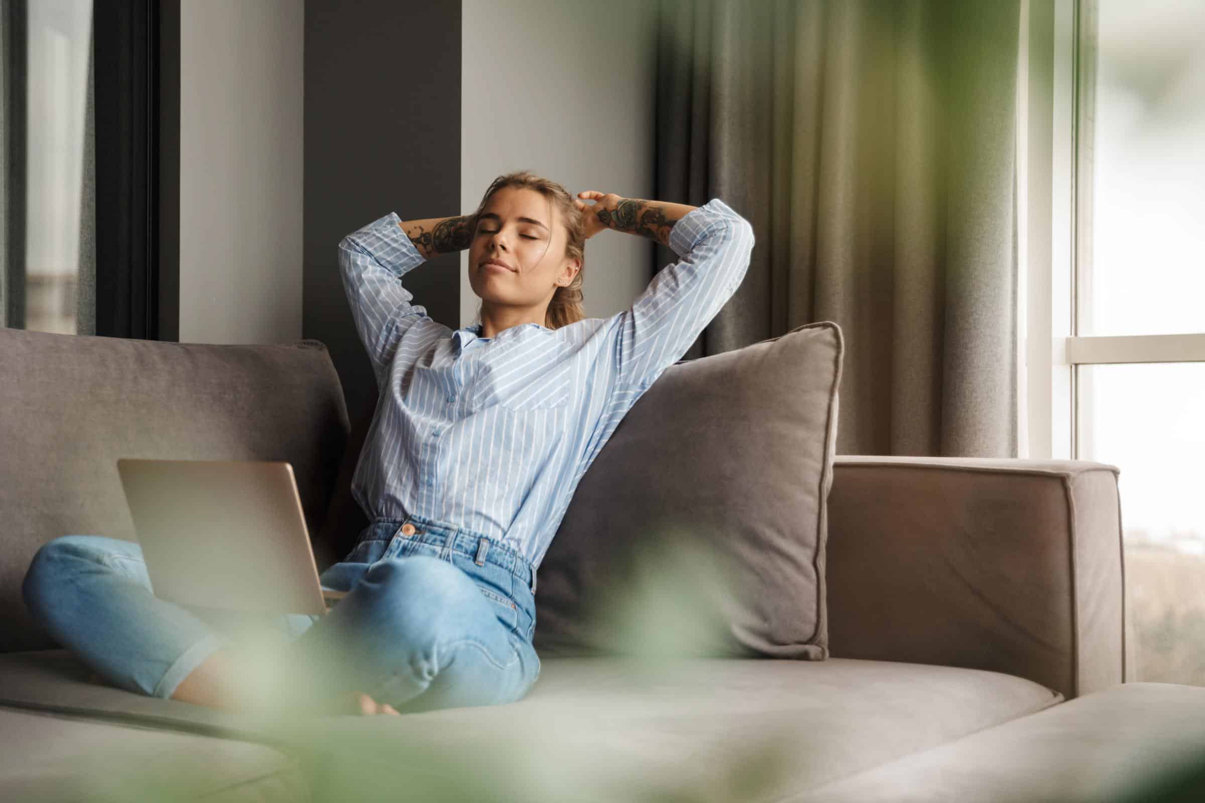 Woman relaxing on couch