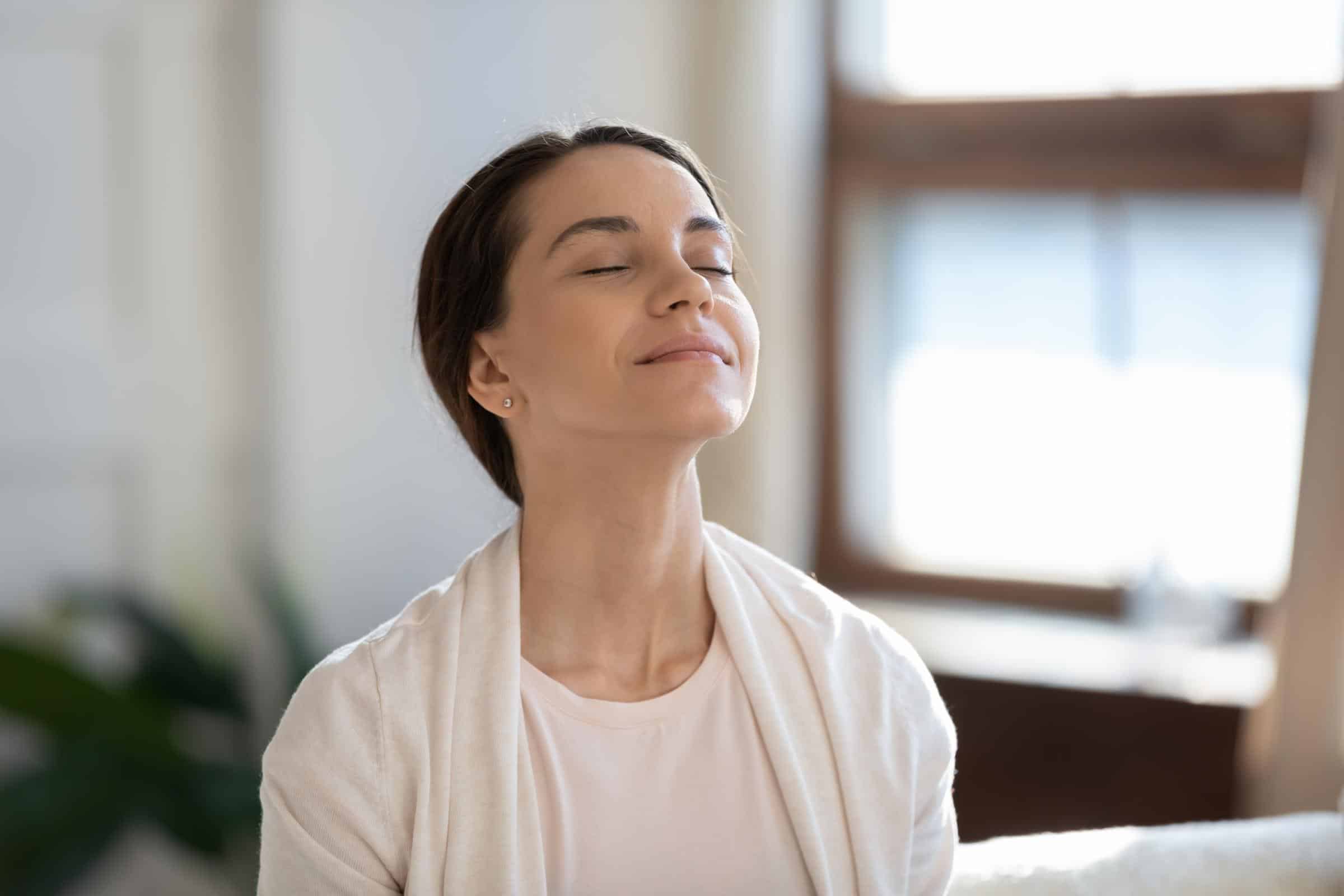 Woman breathing fresh air