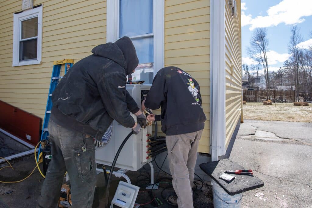 Kearney HVAC team tuning up heat pump system