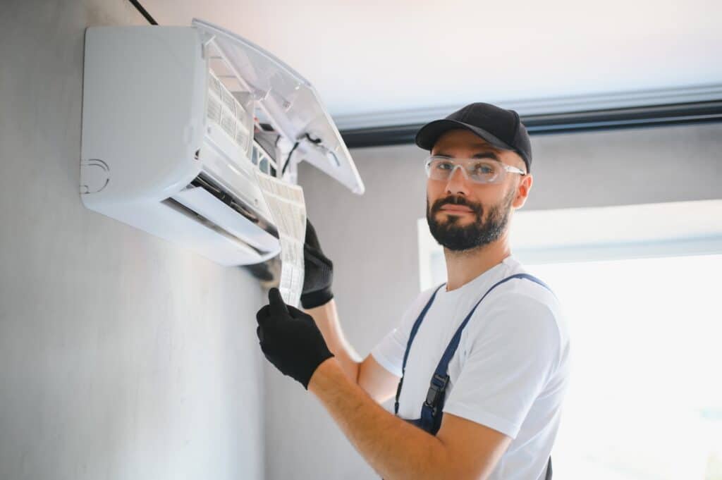 repairman fix air conditioning systems