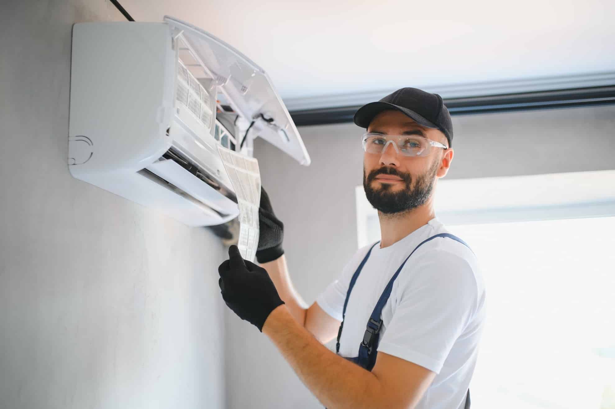 repairman fix air conditioning systems