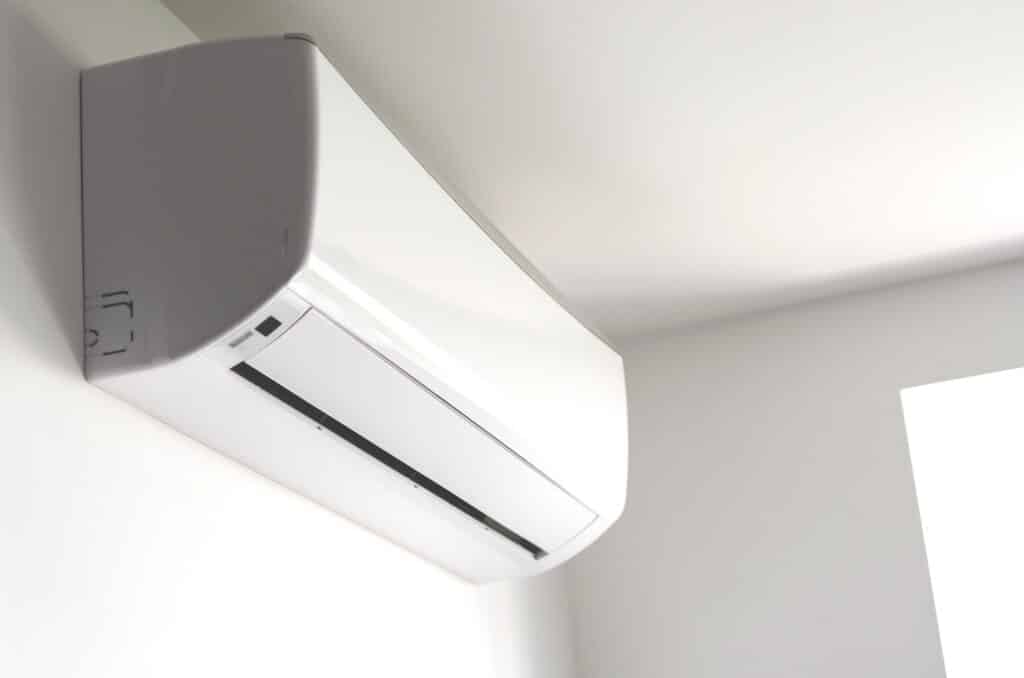 white heat pump on the wall