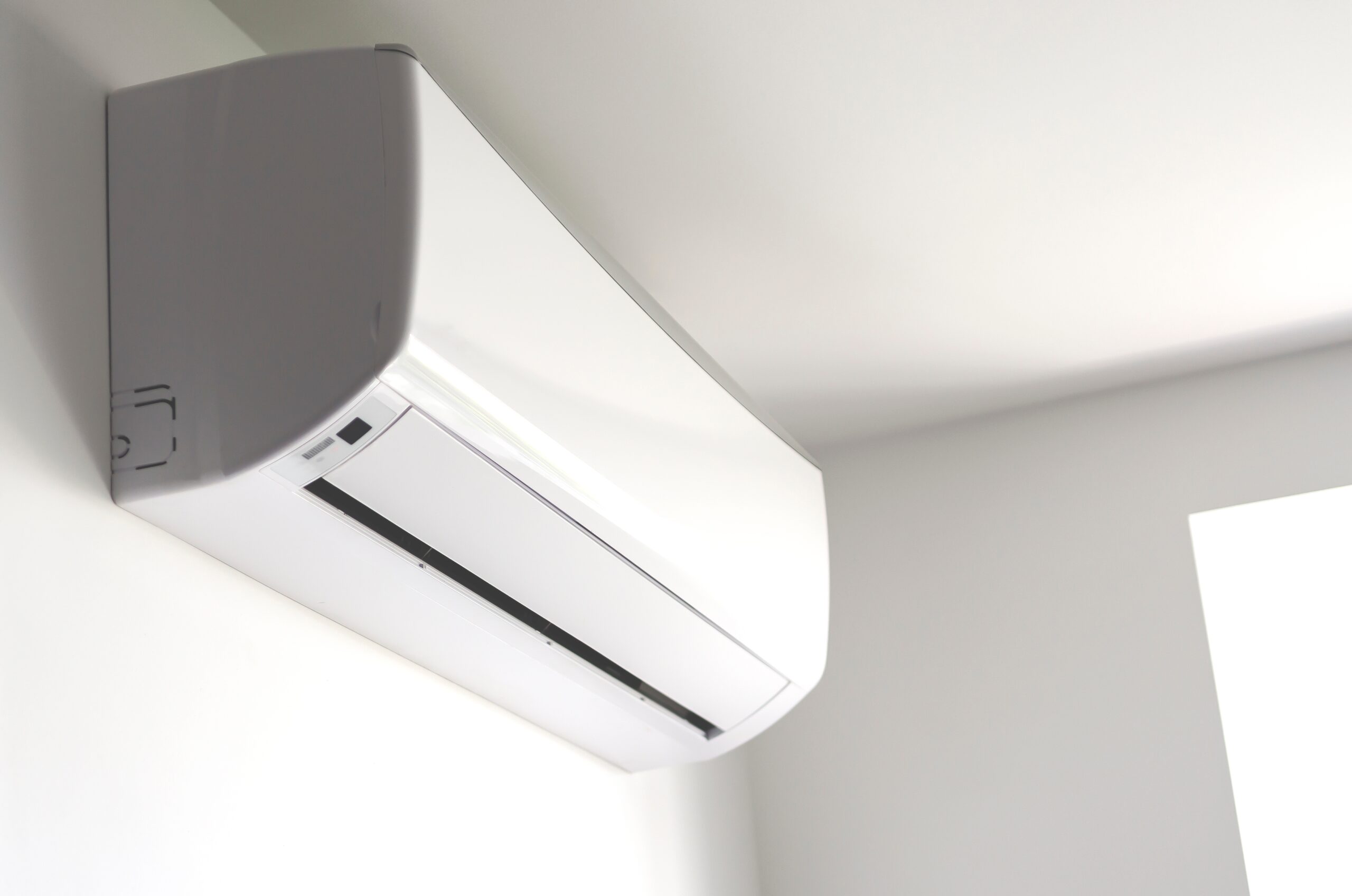 white heat pump on the wall