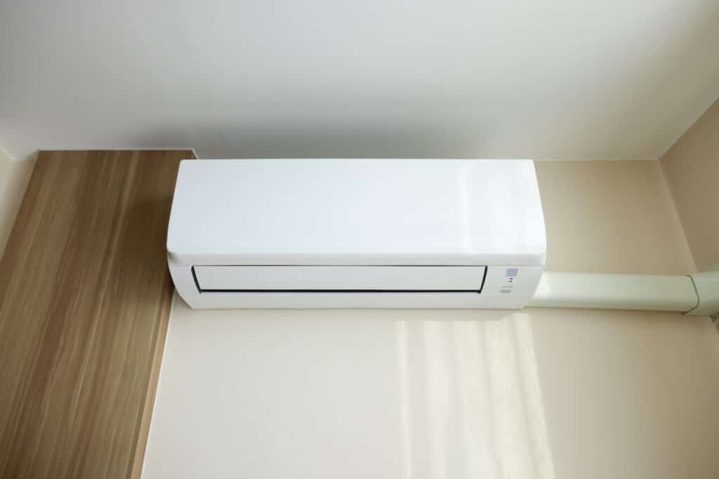 heat pump on a white wall